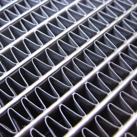 A close view of a Clark forklift radiator core